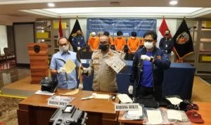 pelaku_pencurian_dnegan_kekerasan_kuras_uang_minimarket_foto_840x576-750x501